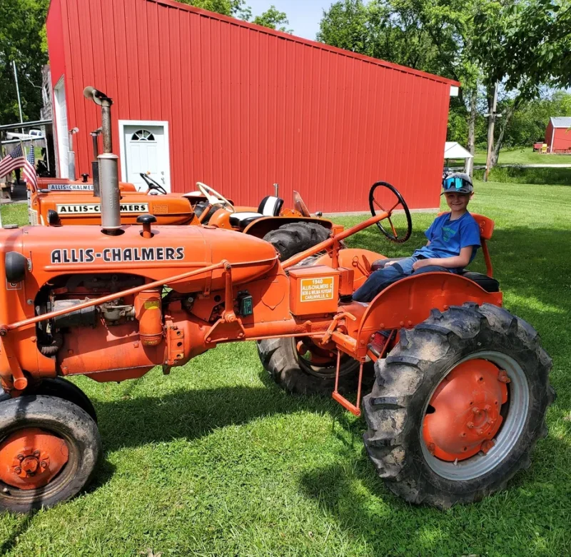 child on ac tractor