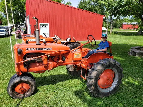 child on ac tractor